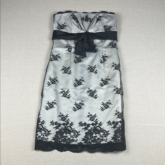 White House Black Market Dresses & Skirts - White House Black Market Black and White Dress with lace overlay NWT
Size: 2